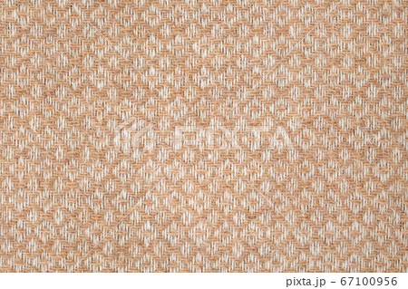 Brown and white geometric woolen fabric background 67100956