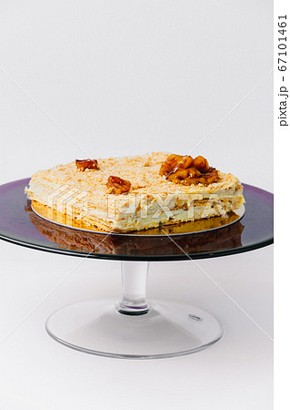 A piece of Napoleon cake on a plate 67101461