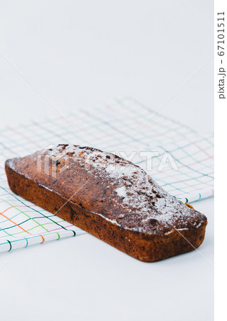 A piece of chocolate cake on a table 67101511