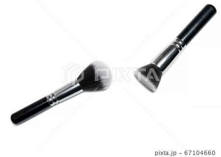 Professional makeup brushes isolated on a white Professional makeup brushes isolated on a white 67104660