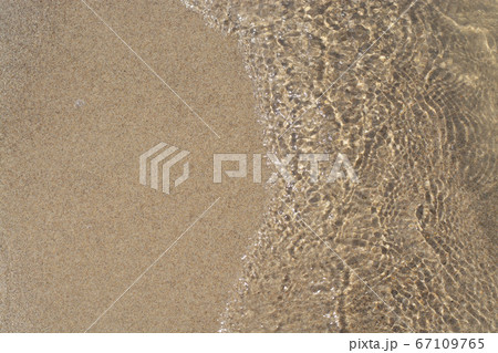 Yellow coarse clear river sand, ripple wave water Yellow coarse clear river sand, ripple wave water 67109765