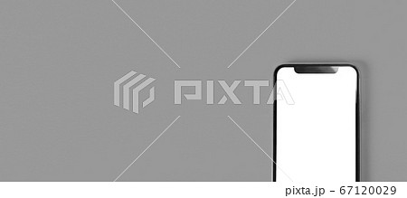 灰色背景の上に置かれたスマホのブランク素材 灰色背景の上に置かれたスマホのブランク素材 67120029