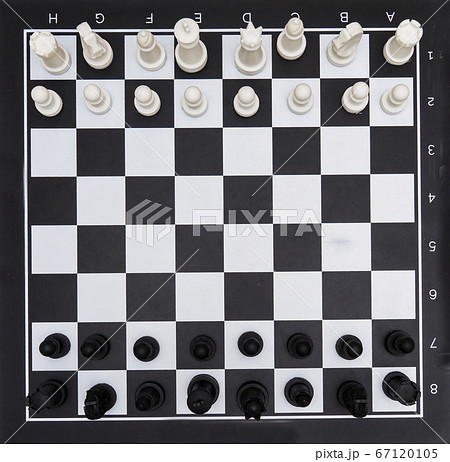 Chessboard with figures, black and white cells, background, texture. Chessboard with figures, black and white cells, background, texture. 67120105
