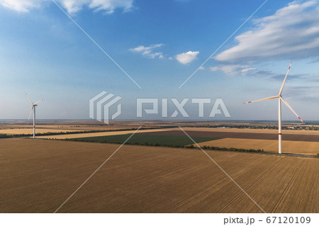 Wind turbines from aerial view. Environment and renewable energy. Aerial photography Wind turbines from aerial view. Environment and renewable energy. Aerial photography 67120109