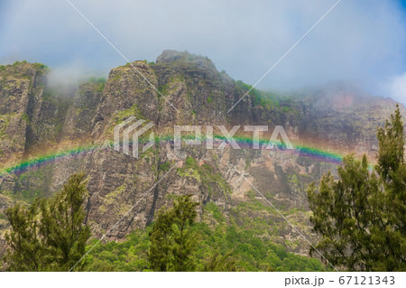 Colorful rainbow and Le Morn brabant mountain in Mauritius 67121343