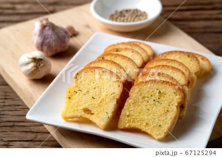 Thai Crispy Garlic Bread on white plate.Thai snack food Thai Crispy Garlic Bread on white plate.Thai snack food 67125294