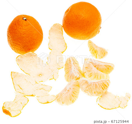 Open and whole tangerines on a white background Open and whole tangerines on a white background 67125944