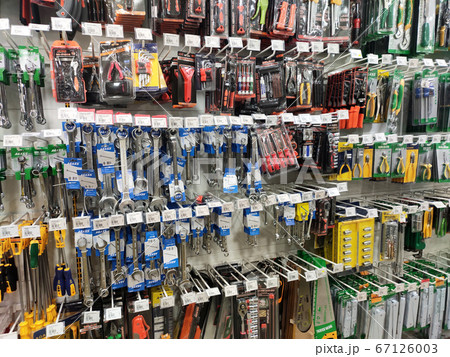 SEREMBAN, MALAYSIA -MAY 02, 2020: Hardware and carpentry tools hung and exhibited for sale in the shop. Sort by type and brand. Marked with the price tag. SEREMBAN, MALAYSIA -MAY 02, 2020: Hardware and carpentry tools hung and exhibited for sale in the shop. Sort by type and brand. Marked with the price tag. 67126003