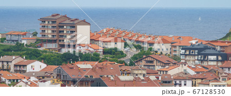 Cityscape of Zumaia in summer day. Bay of Biscay in Basque Autonomous Community / country. The surface of Atlantic ocean in distance. View from above. High resolution image. Cityscape of Zumaia in summer day. Bay of Biscay in Basque Autonomous Community / country. The surface of Atlantic ocean in distance. View from above. High resolution image. 67128530