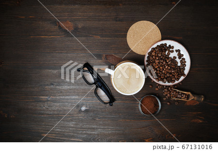 Coffee on wood table Coffee on wood table 67131016