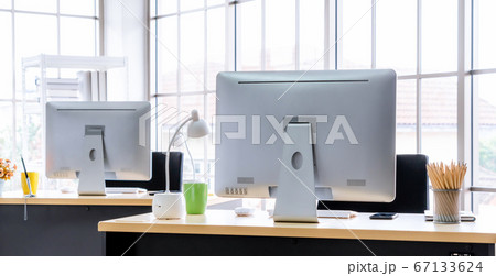 Desktop PC computers in small modern office or home office. 67133624