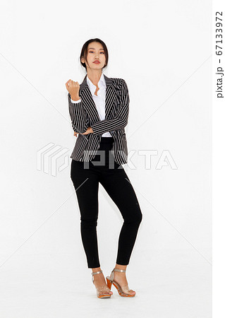 Asian woman full body portrait on white background Asian woman full body portrait on white background 67133972