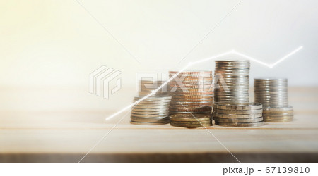Coins on wooden table business concept 67139810