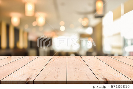 Empty wooden table top with lights bokeh on blur 67139816