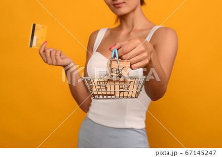 Close up of female hand horizontal holds toy metal Close up of female hand horizontal holds toy metal 67145247