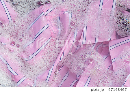 Color clothes soak in powder detergent water Color clothes soak in powder detergent water 67148467