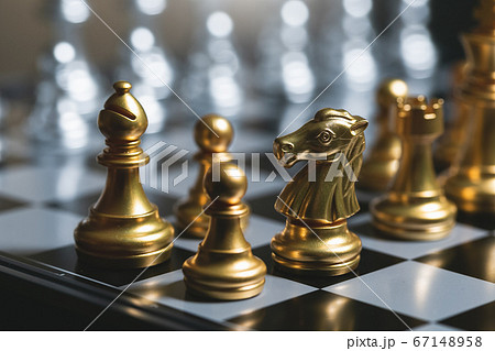 Gold pawn surrounded by gold chess pieces on a 67148958