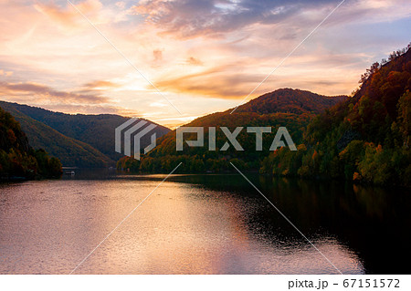 sunset on the tarnita lake in romania. beautiful 67151572