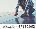 labor working on solar rooftop, Engineering of 67152962