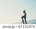 labor working on solar rooftop, Engineering of 67152974