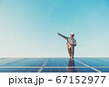 labor working on solar rooftop, Engineering of 67152977