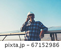 labor working on solar rooftop, Engineering of 67152986