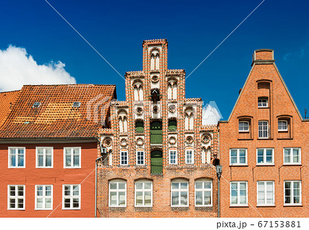 Facades of the old historical buildings made of red brick Facades of the old historical buildings made of red brick 67153881