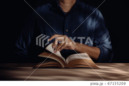 Reading Book Concept, Person Sitting on Desk and Reading Book Concept, Person Sitting on Desk and 67155209