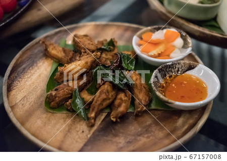 Fried chicken served on plate 67157008