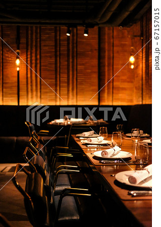 Seating inside the restaurant at night Seating inside the restaurant at night 67157015