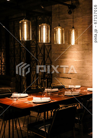 Seating inside the restaurant at night Seating inside the restaurant at night 67157016