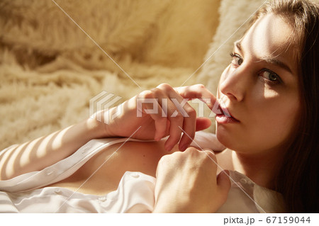 woman in sun light woman in sun light 67159044