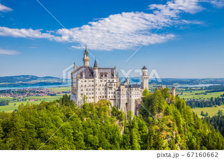 Famous Neuschwanstein Castle with scenic mountain Famous Neuschwanstein Castle with scenic mountain 67160662