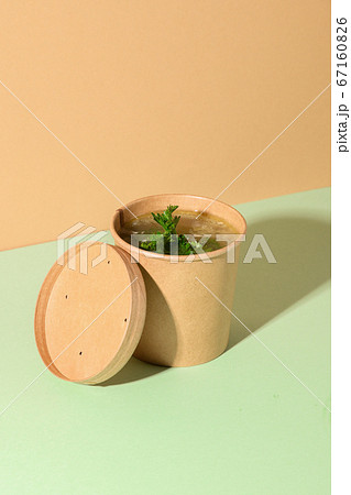 Healthy chicken broth on brown paper. Healthy chicken broth on brown paper. 67160826