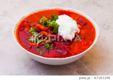 The portion of appetizing and rich borscht 67161206