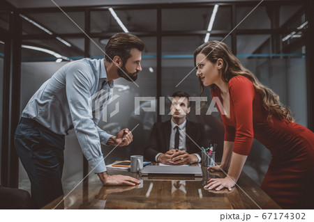 Couple having an argument in lawyers office 67174302