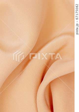 Fabric golden in natural silk. Peach smooth silk fabric. 67175082
