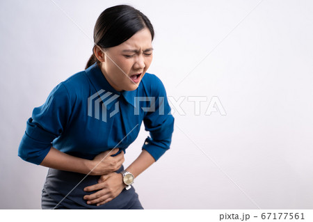 Portrait of Asian woman was sick with stomach ache 67177561