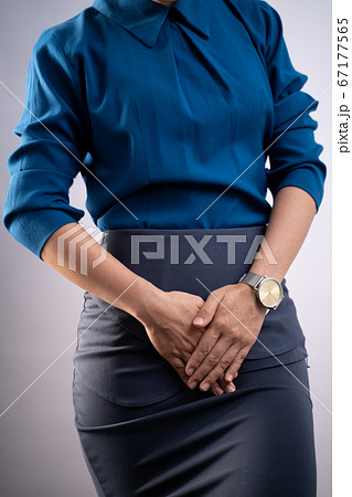 Closeup  shot of woman having painful holding 67177565