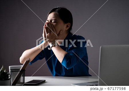 Asian woman in blue shirt was sick with fever, Asian woman in blue shirt was sick with fever, 67177598