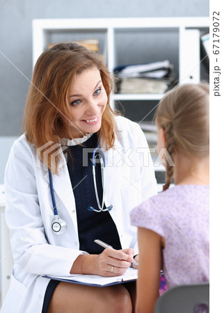 Little child with mother at pediatrician reception 67179072