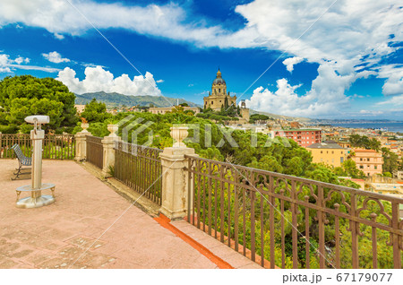 Picturesque cityscape of Messina viewed from a balcony with fence 67179077