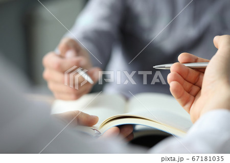 Two business partners are going to sign contract Two business partners are going to sign contract 67181035