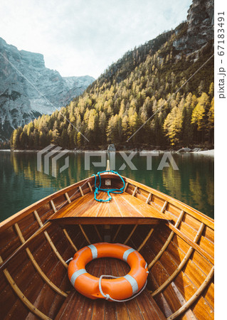Traditional rowing boat at Lago di Braies in the Dolomites, South Tyrol, Italy Traditional rowing boat at Lago di Braies in the Dolomites, South Tyrol, Italy 67183491