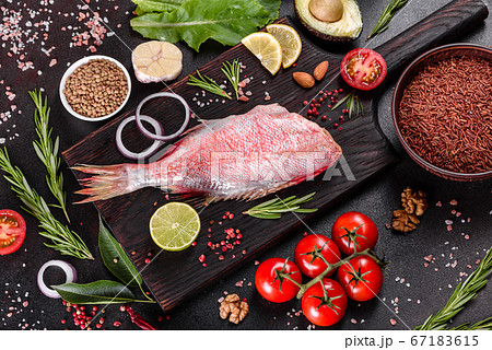 Raw fillet of red sea perch prepared for baking Raw fillet of red sea perch prepared for baking 67183615