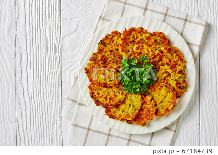 Easy low sodium onion fritters with green herbs 67184739