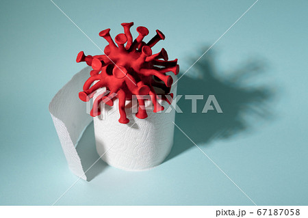 Red model of coronavirus on the toilet paper roll 67187058
