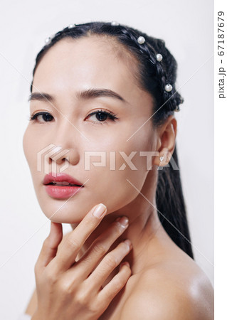 Serious attractive Asian woman 67187679