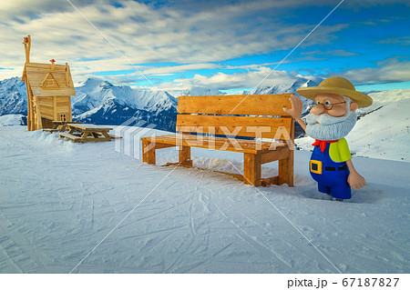 Mountain rest area with wooden benches in the French Alps Mountain rest area with wooden benches in the French Alps 67187827