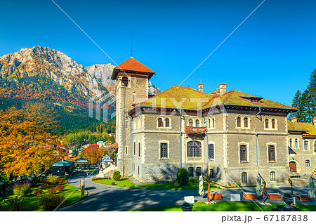 Cantacuzino castle with garden and Bucegi mountains in background, Romania 67187838